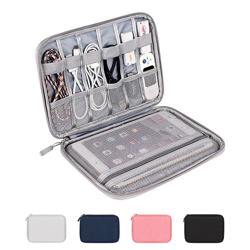 Gray travel organizer with compartments for electronic devices on a white background